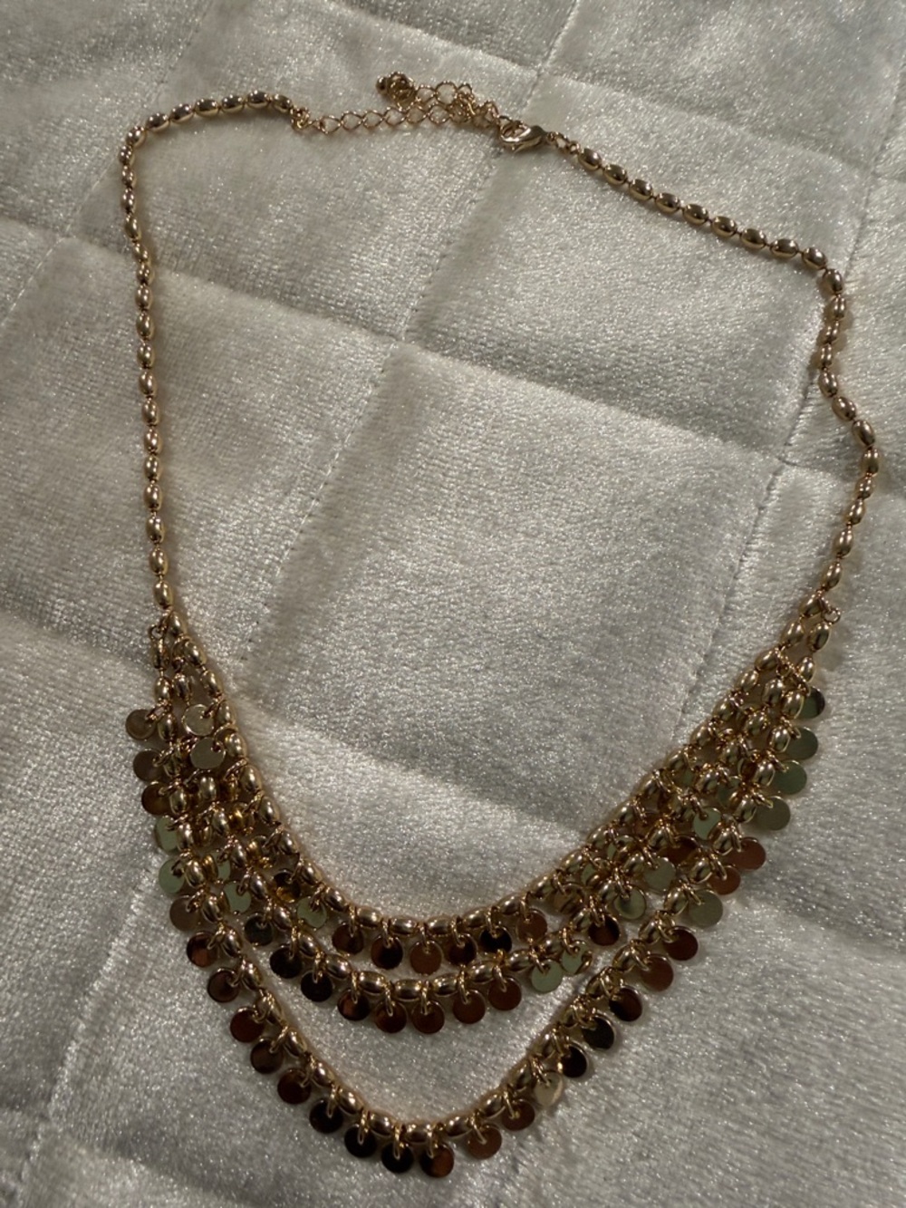 Gold Tone Layered Disc Necklace with Cascading Charms